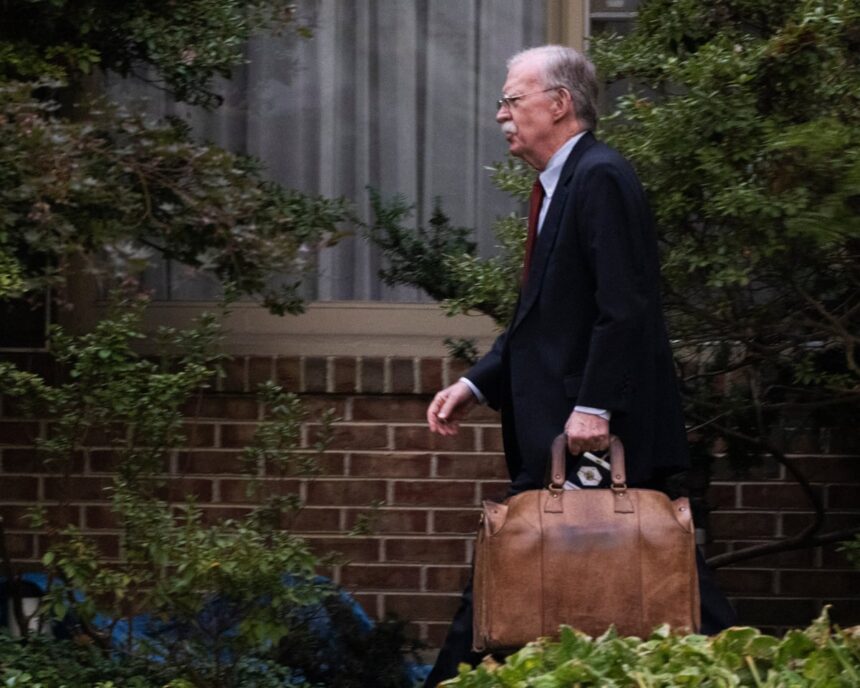 ex trump adviser john bolton surrenders after indictment 68f23d0290ea3