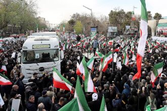 iranian protestors hold trump assassination attempt photo chant death to america state media shows 69692caeb3d3b