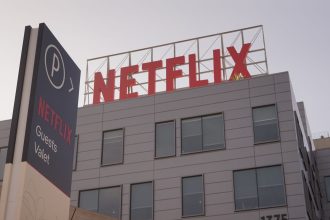 stocks making the biggest moves midday bank stocks netflix duolingo aes sunrun and more 69a1d510614b4