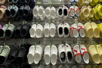 stocks making the biggest moves midday crocs cisco lululemon applovin more 698e148593438