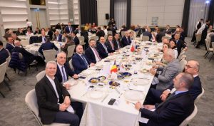 Turkish Ambassador to Romania Özgür Kıvanç Altan speaking at the TIAD Iftar dinner in Bucharest with TIAD President Ufuk Tandoğan and members of the diplomatic and business community.