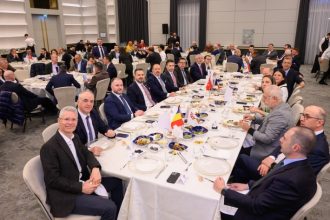 Turkish Ambassador to Romania Özgür Kıvanç Altan speaking at the TIAD Iftar dinner in Bucharest with TIAD President Ufuk Tandoğan and members of the diplomatic and business community.
