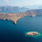 Commercial vessels transiting the Strait of Hormuz as Oman opens a toll free temporary maritime corridor in coordination with the IMO