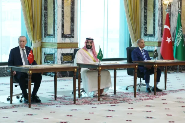 Mohammed bin Salman, Recep Tayyip Erdoğan and Shehbaz Sharif at the signing of the Makkah Joint Defence Agreement in Mecca, 7 August 2026.