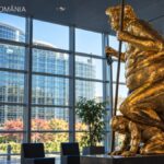 AI-generated illustration recreating the gilded statue depicting Donald Trump in a corridor of the European Parliament in Strasbourg.